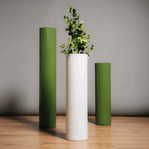 Matera Cilindrus de 10 cm en aluminio de dosdos design, ideal para repisas, escritorios o mesas decorativas.